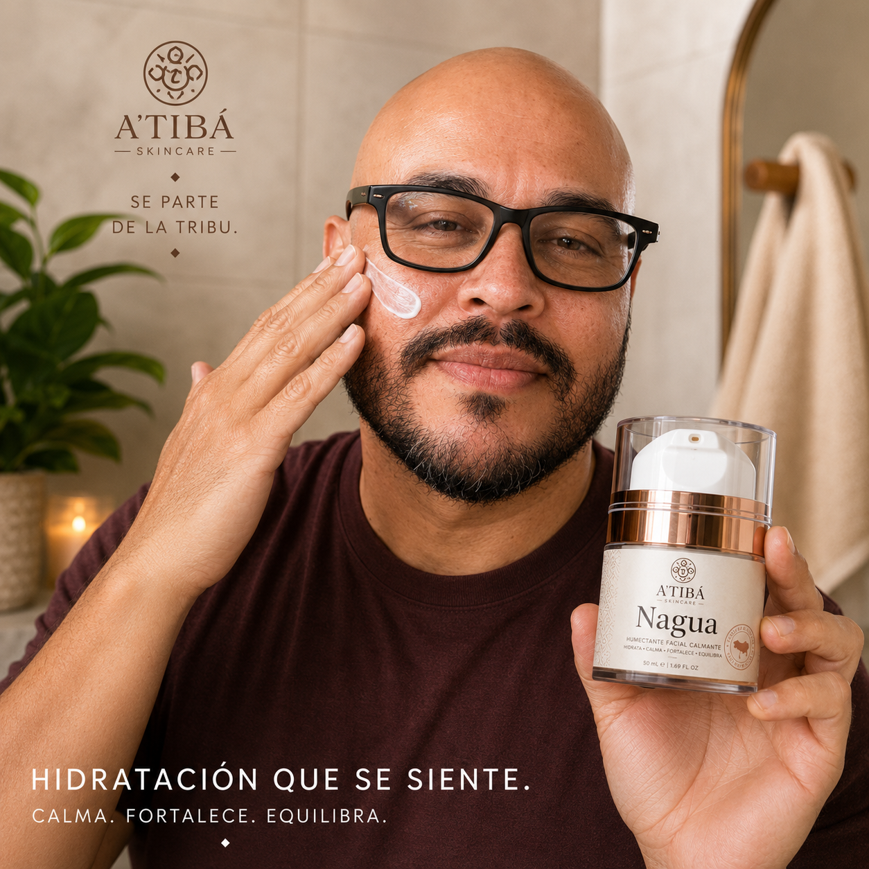 NAGUA™ — female close-up lifestyle shot, woman with cream swatch on cheek holding NAGUA jar, niacinamide ectoin beta glucan face moisturizer by A'TIBÁ Skincare